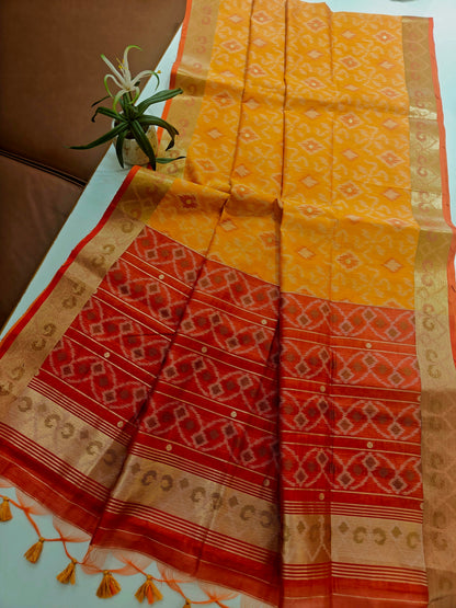 Raw Silk Ikkat Saree With Zari Woven Border-orange