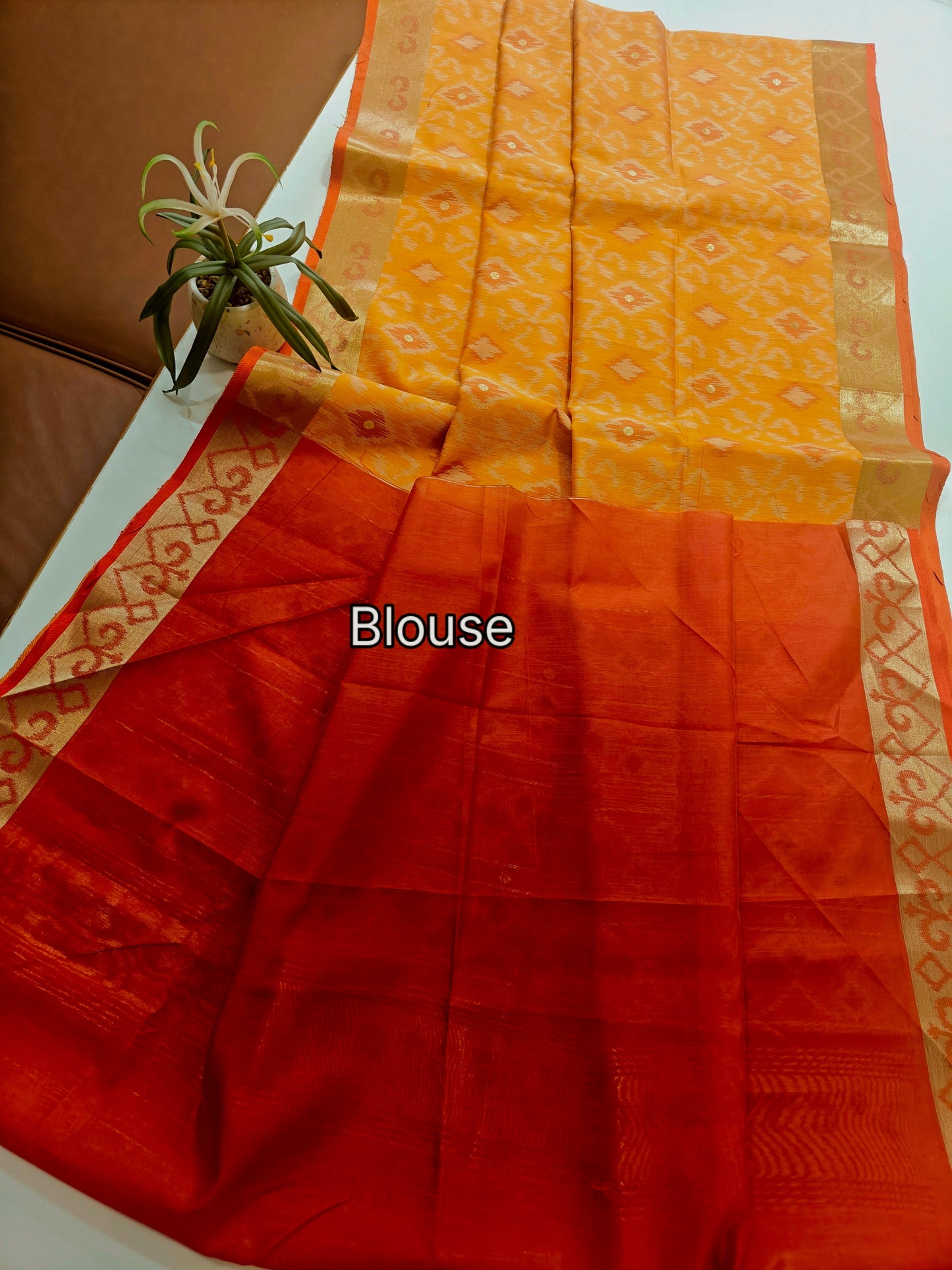 Raw Silk Ikkat Saree With Zari Woven Border-orange